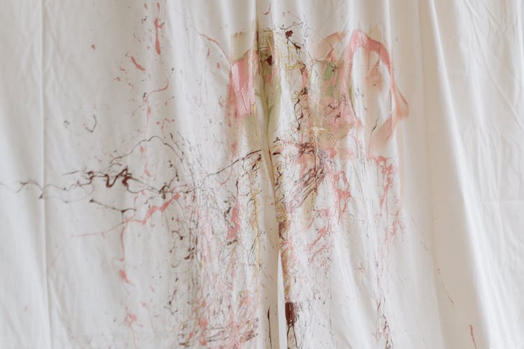 A White Cloth With Paint Splatter