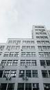 White Concrete Building Under White Sky
