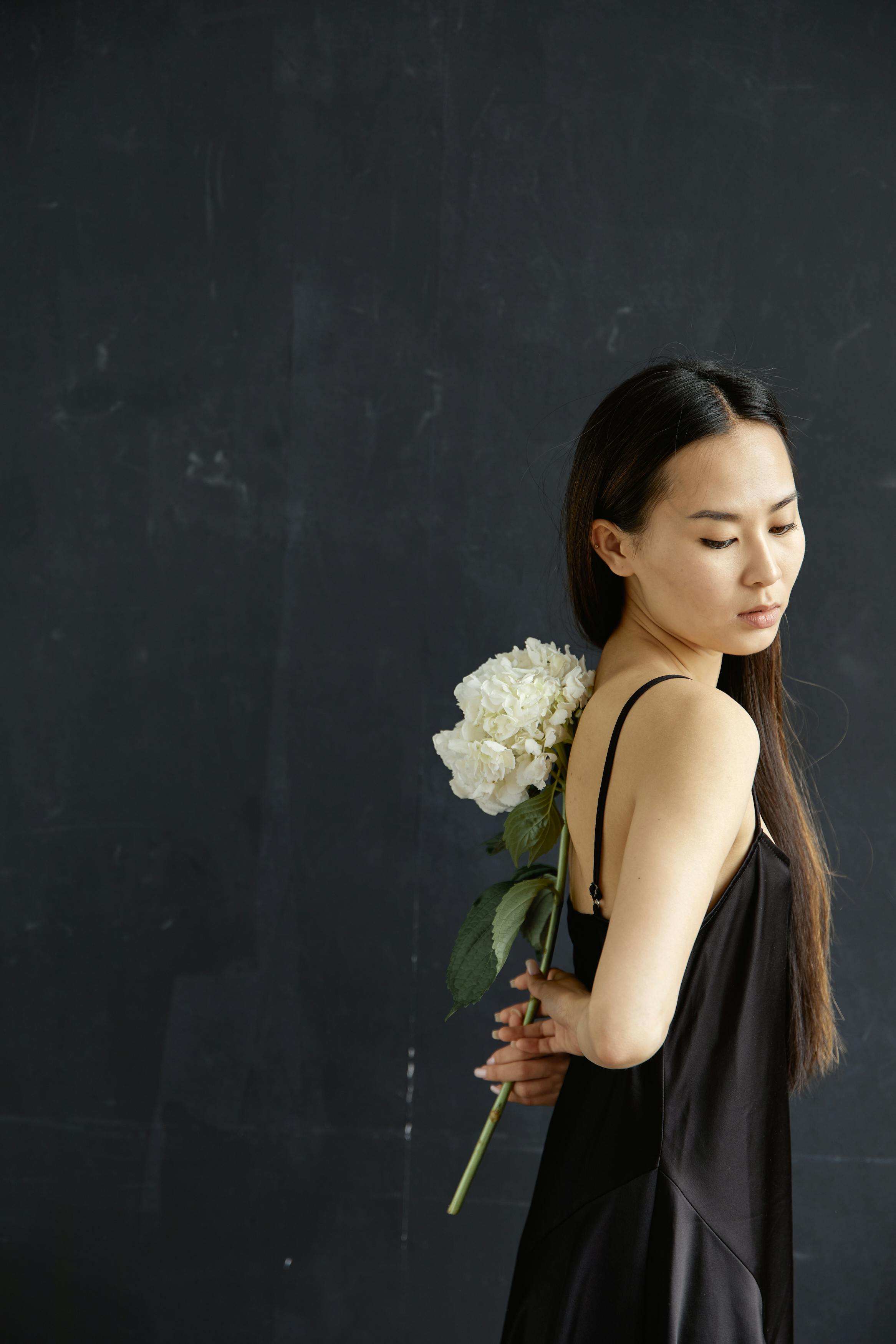 A Woman in a Black Dress  Free Stock Photo