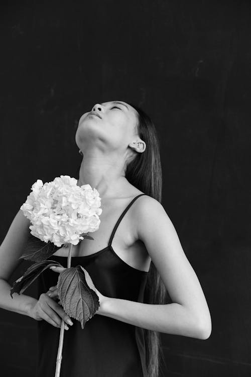 Woman Posing with Flowers