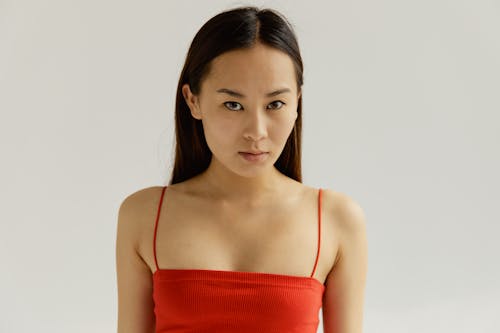 Young Woman in Red Strap Top