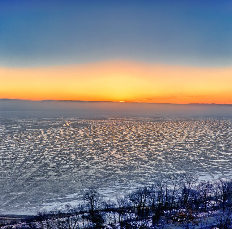 Frozen Lake During Sunrise