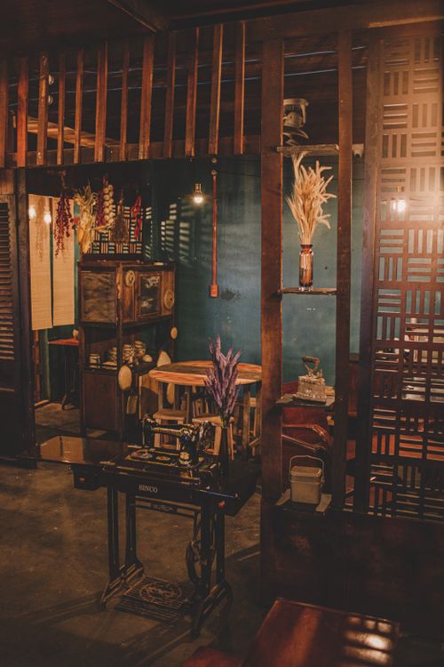 Free Warm rustic interior featuring vintage furniture and decor with soft lighting creating a cozy atmosphere. Stock Photo