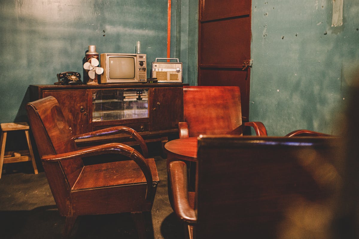Person wearing a modern virtual reality headset in a bright room