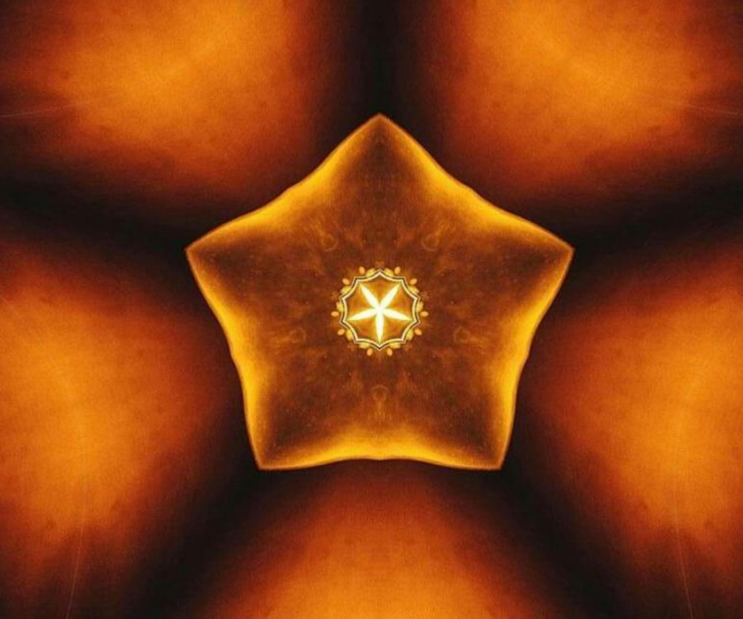 Top-down view of a mechanical keyboard, coffee cup, and notepad on a desk