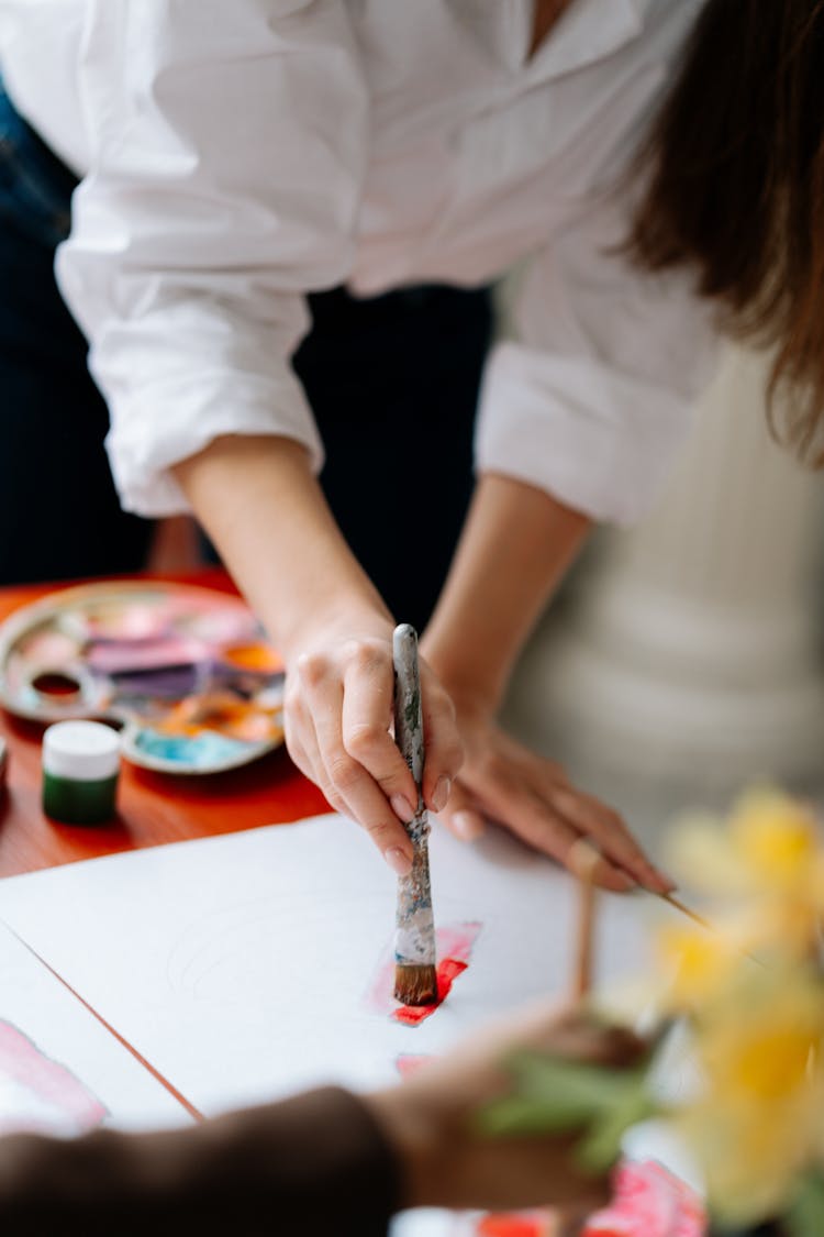 A Woman's Hands Painting