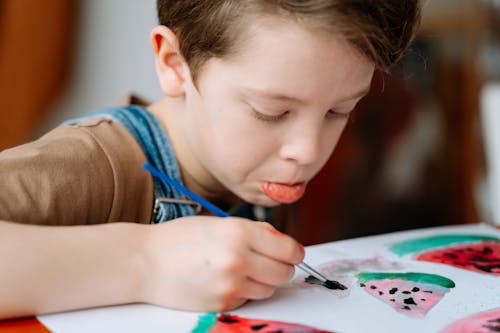 Little Boy Painting Watermelons 