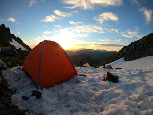 Orange Tent on Snow Covered Ground
