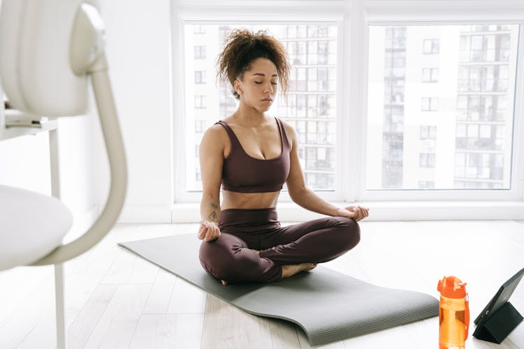 A Woman Doing A Yoga 