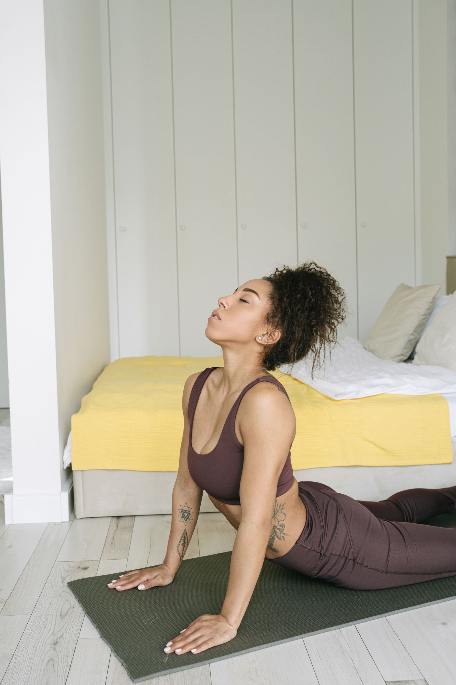 Accessible home yoga poses Woman doing yoga on a mat