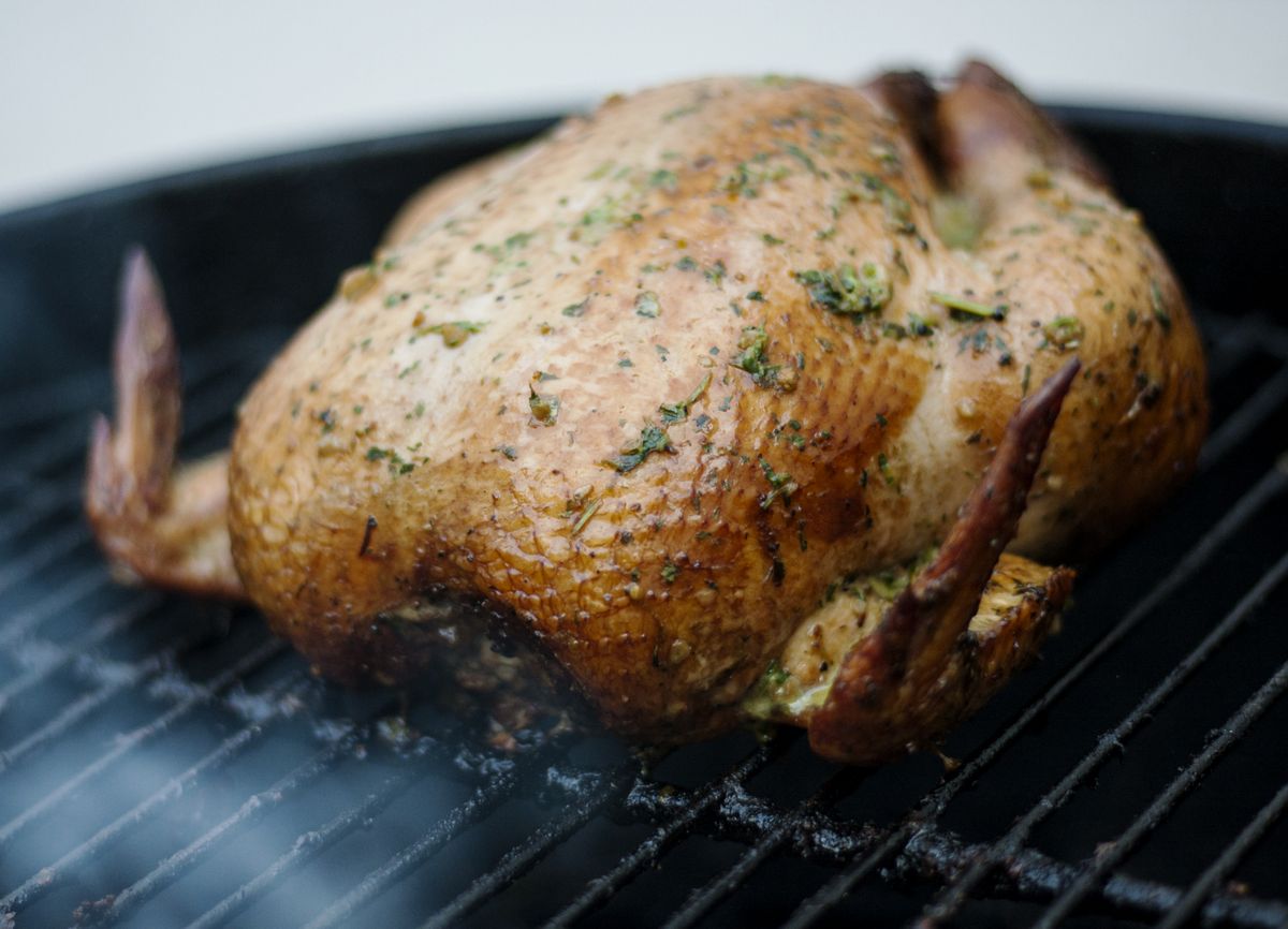 how long to smoke a whole chicken at 225 — whole herb-seasoned chicken with crisp golden skin fresh off the grill