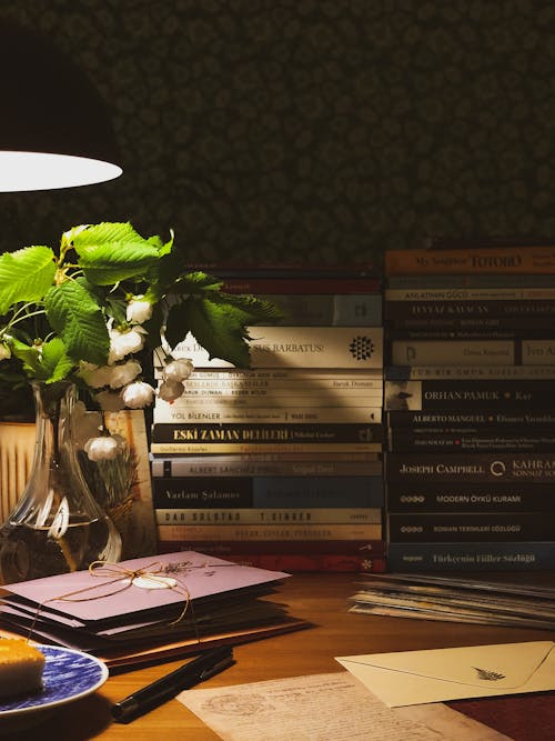 Books and letters on wooden table