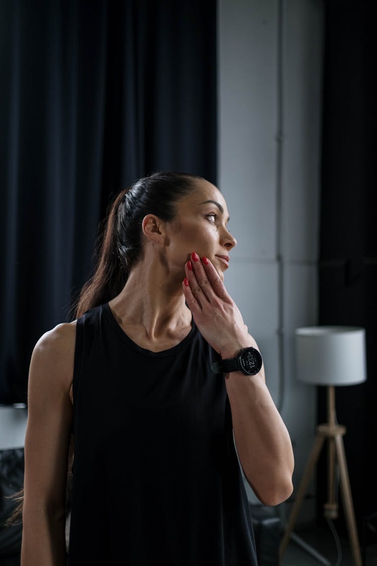 Woman Stretching Her Neck 