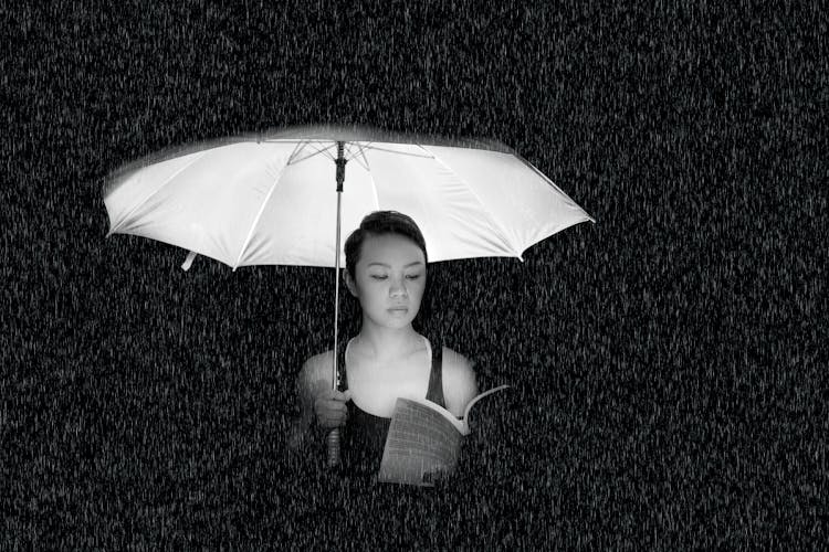 Woman Holding An Umbrella Greyscale Photo