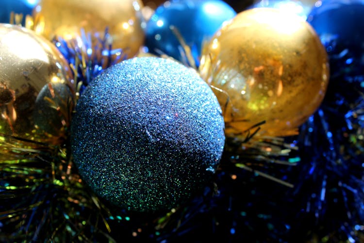 Gray, Blue, And Gold-colored Baubles