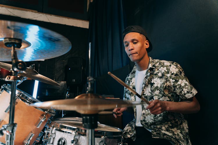 Man Playing Drums On The Stage