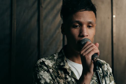 
A Man in a Floral Shirt Singing