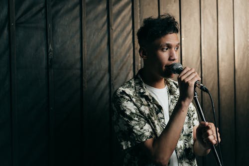 
A Man in a Floral Shirt Singing