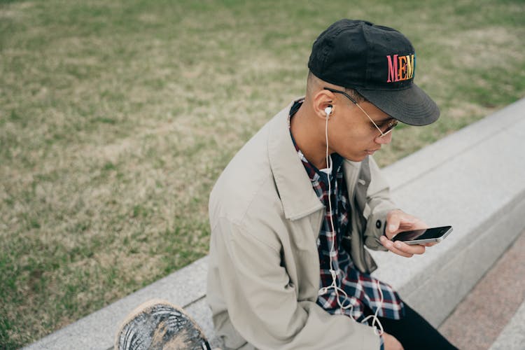 A Man Listening A Music Using Smartphone 