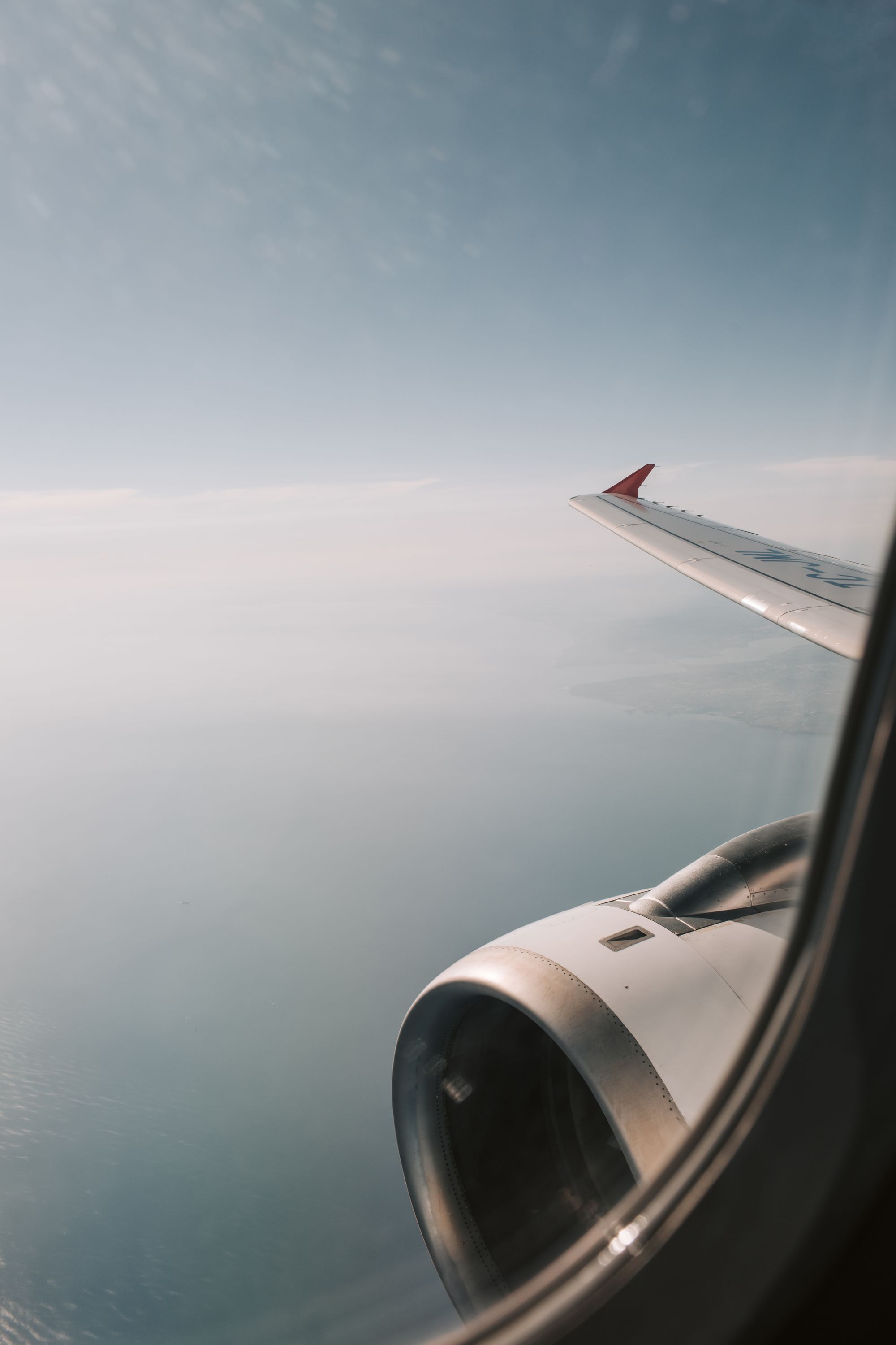 Aircraft wing above the clouds