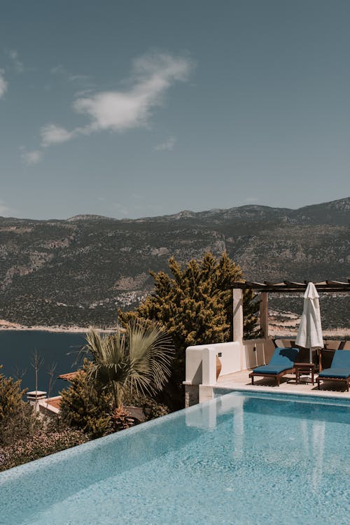 Swimming Pool With View Of Mountain And Sea