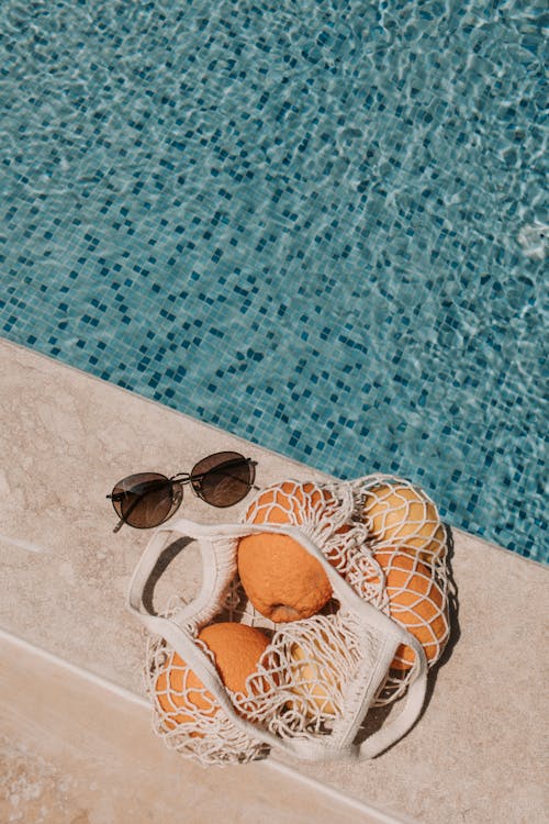 Бесплатное стоковое фото с активный отдых, апельсины, бассейн