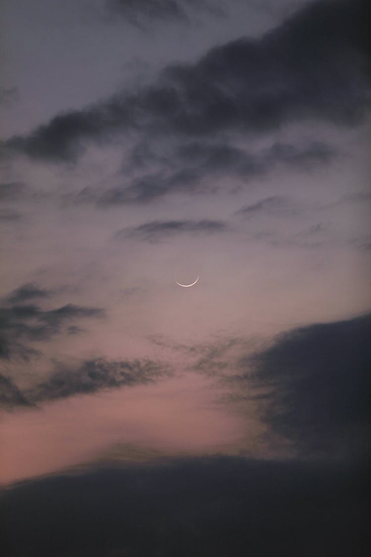 Crescent Moon In Evening Sky