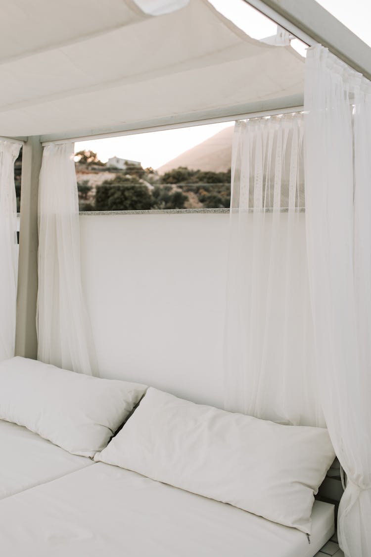 Cozy Bedroom With White Bed Linen 