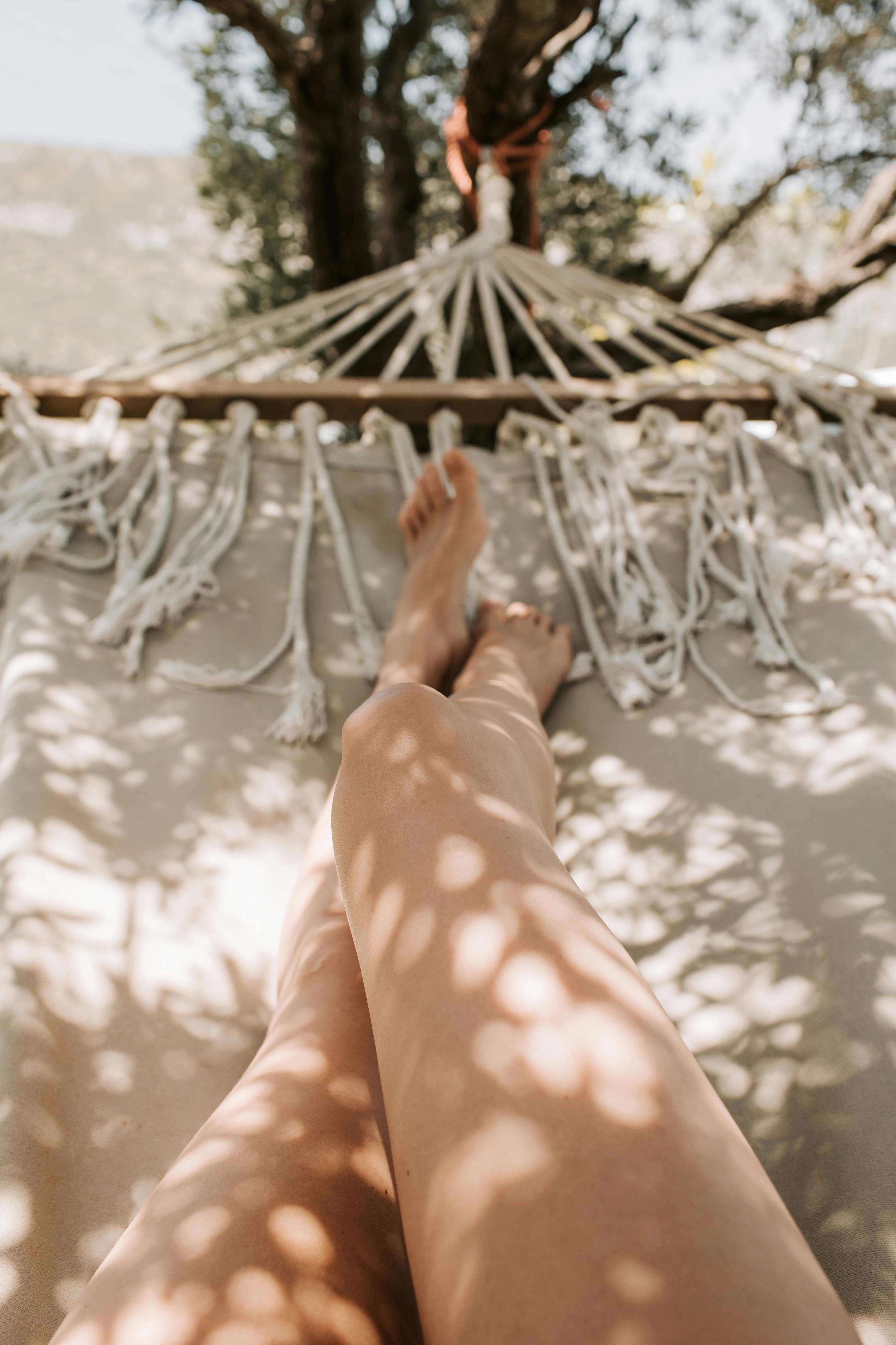 woman lying on a hammock