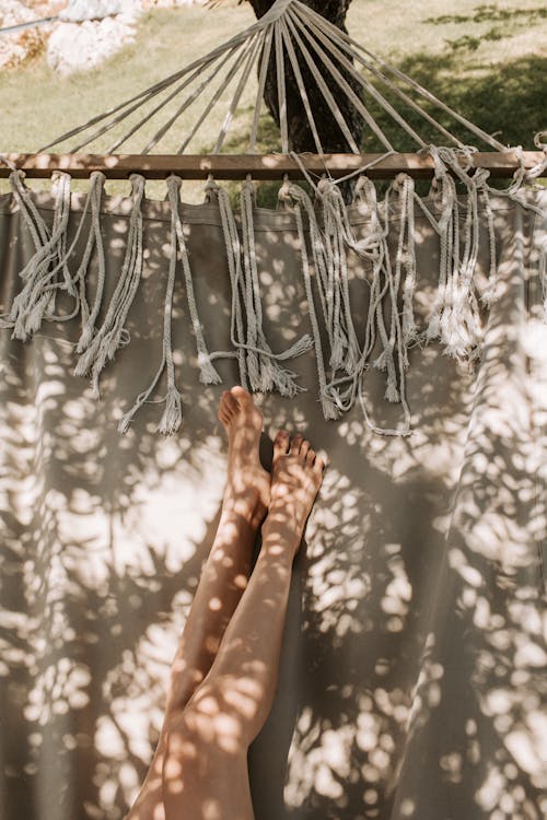 Free Crop Photo Of Woman Lying On A Hammock Stock Photo