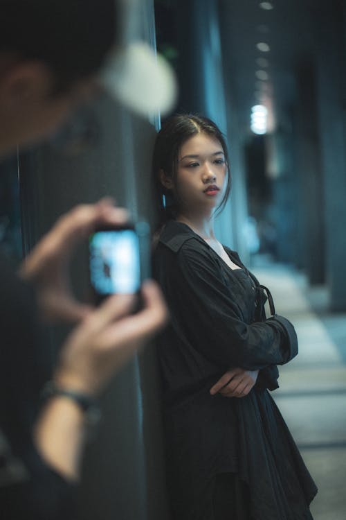 Female Fashion Model Posing in an Empty Alley at Night