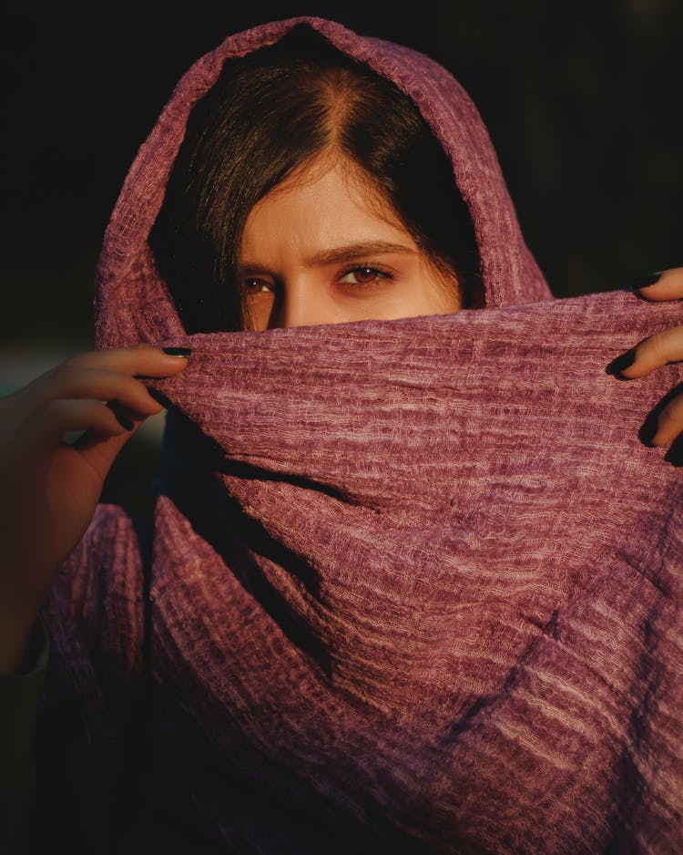 Portrait Of A Woman Covering Her Face