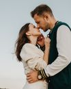 Loving couple kissing on street