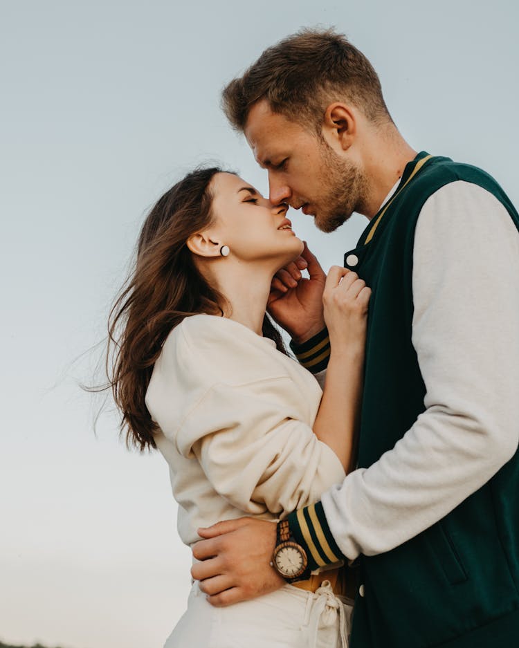 Loving Couple Kissing On Street