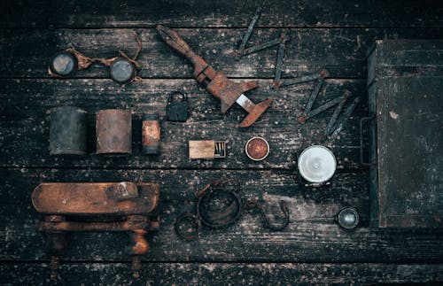 Free Old tools on wooden surface Stock Photo
