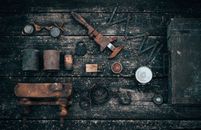 Old tools on wooden surface