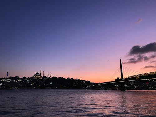 Kostenloses Stock Foto zu brücke, dämmerung, fluss