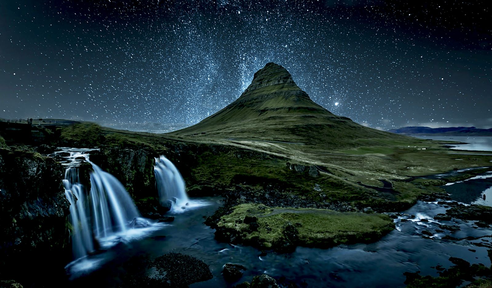 Kirkjufell mountain waterfall stars Milky Way Snæfellsnes Iceland