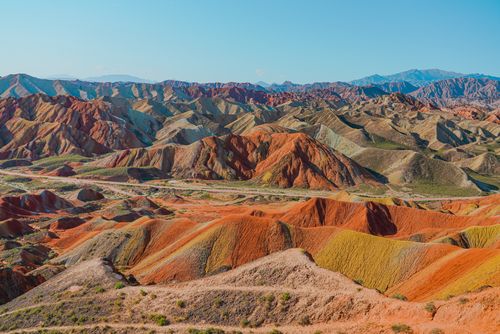 Free Vibrant layered rock formations in Zhangye Danxia National Geopark, China. Stock Photo
