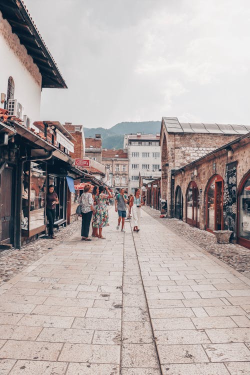 Free Tourist Walking in the Streets of Sarajevo Stock Photo
