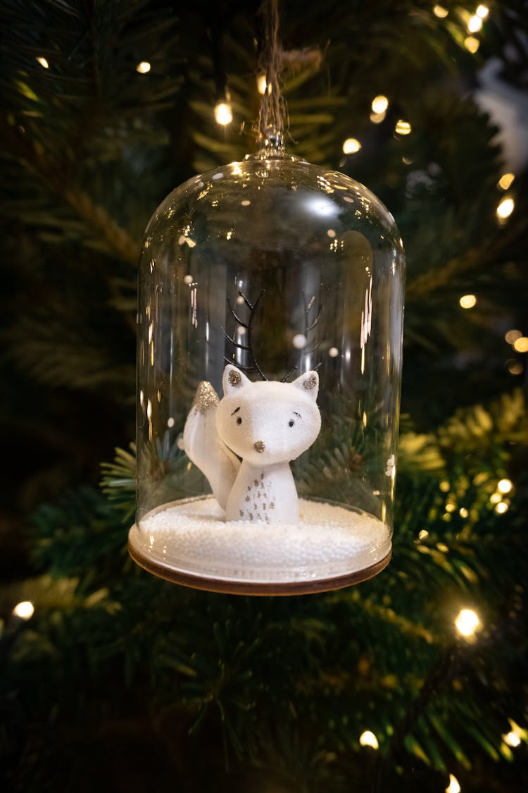 An Arctic Fox In A Glass Christmas Bauble 