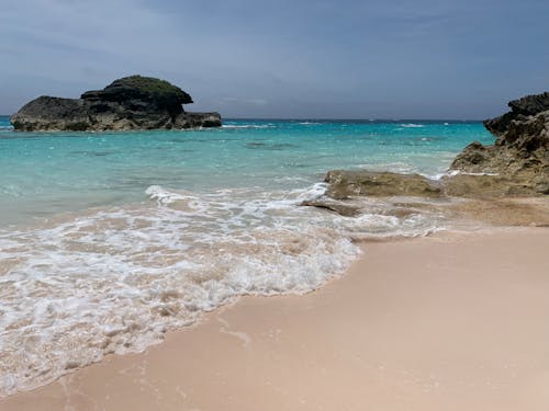 Foto profissional grátis de água azul-turquesa, areia, costa