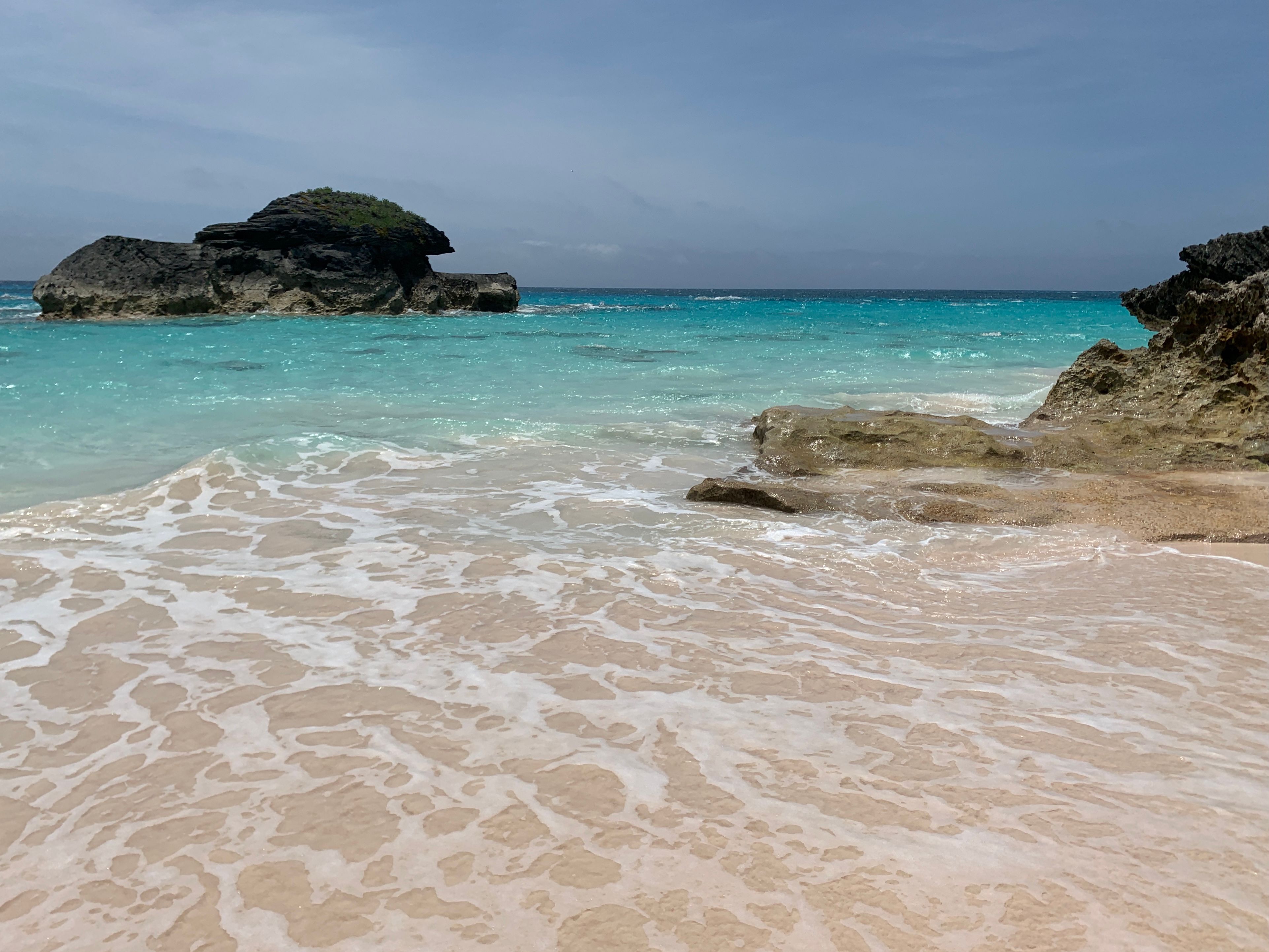 Iconic Pink Sand Beach with turquoise water on Harbour Island, Bahamas