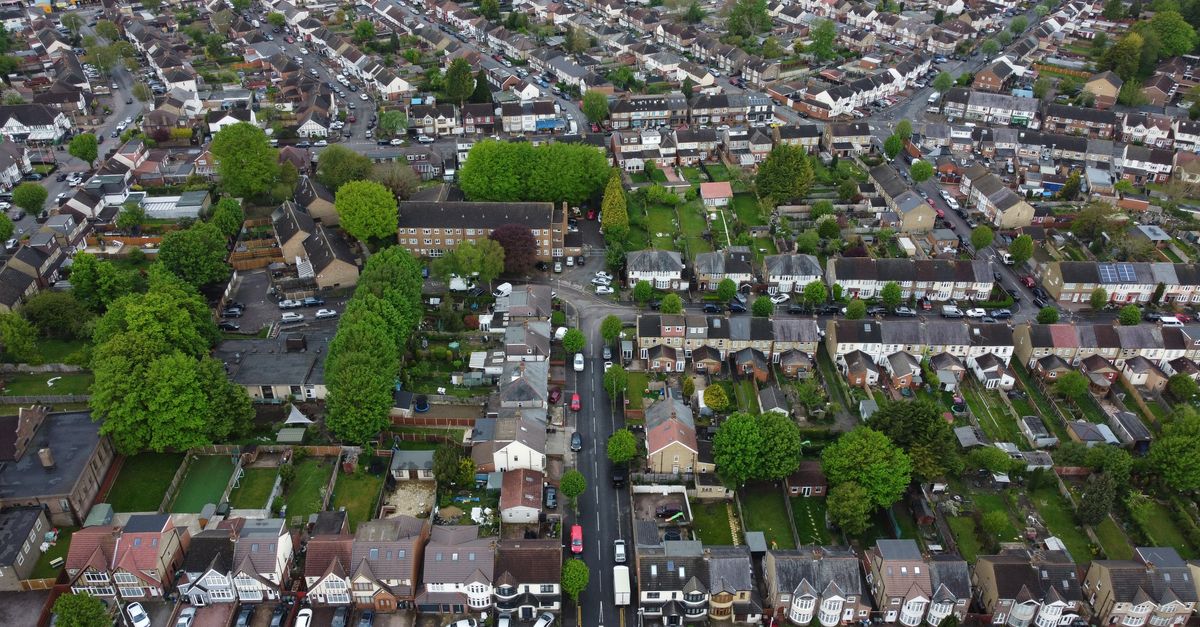 High-angle aerial view of a residential neighborhood in Luton, England showing houses and streets.