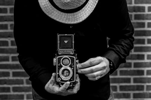 Free Photo of Person Holding Vintage Camera Stock Photo