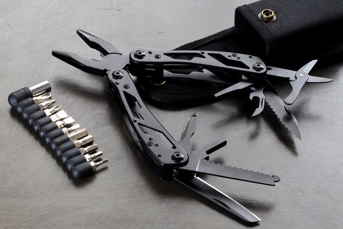 Silver Multi Hand Tool in Close Up Photography · Free Stock Photo