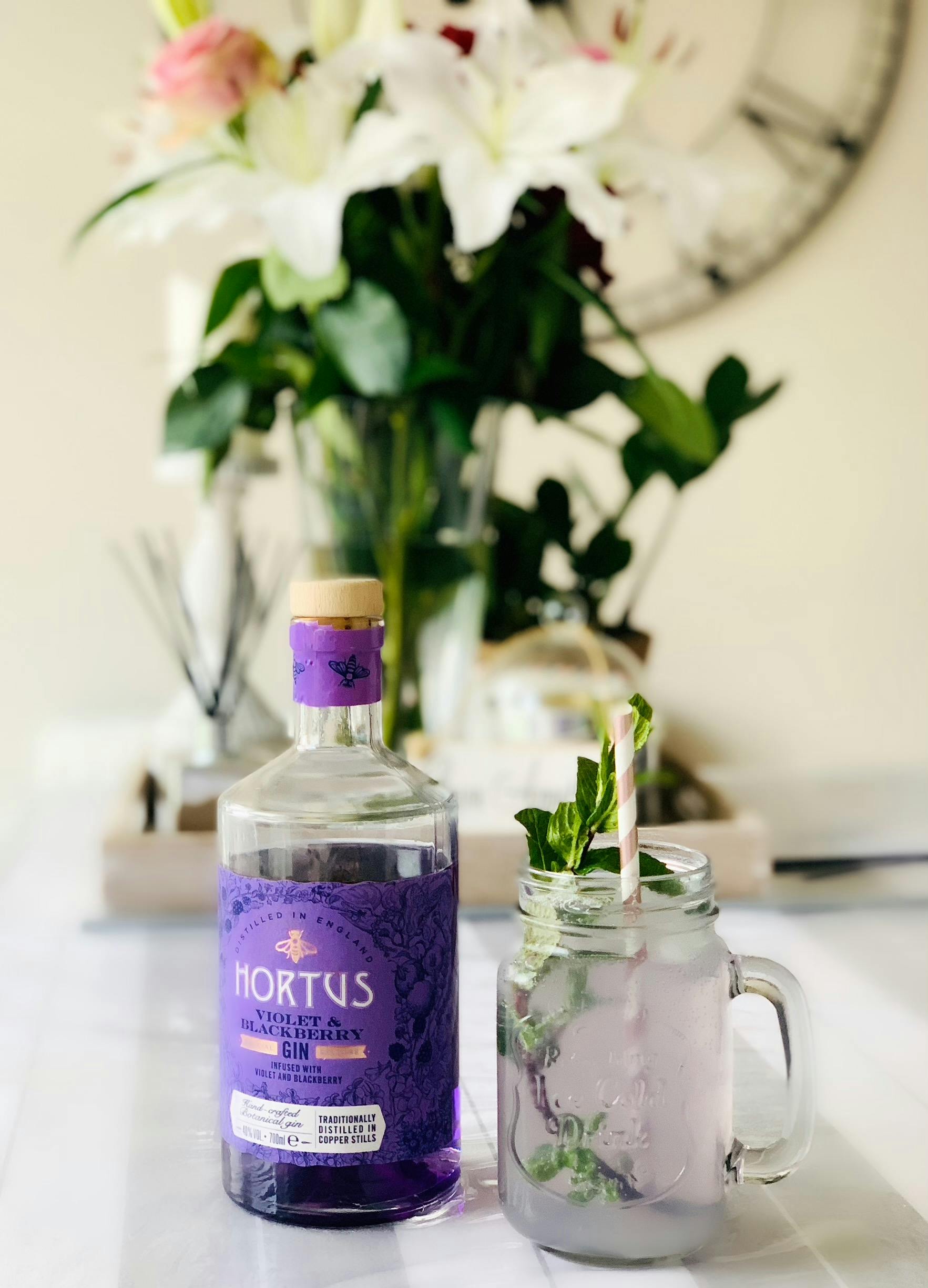 alcohol bottle beside a cold drink