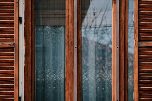Brown Wooden Framed Glass Window