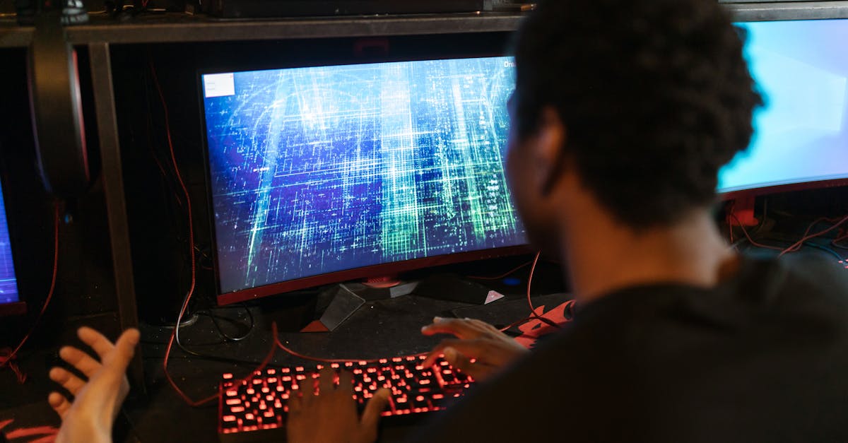 Man Using a Gaming Computer · Free Stock Photo