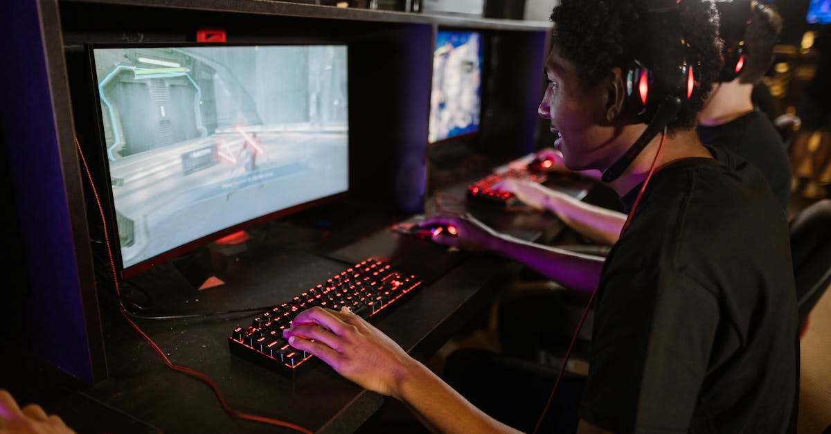 Focused gamers playing on high-performance computers in a cyber cafe. Capturing the intensity of an online gaming session.